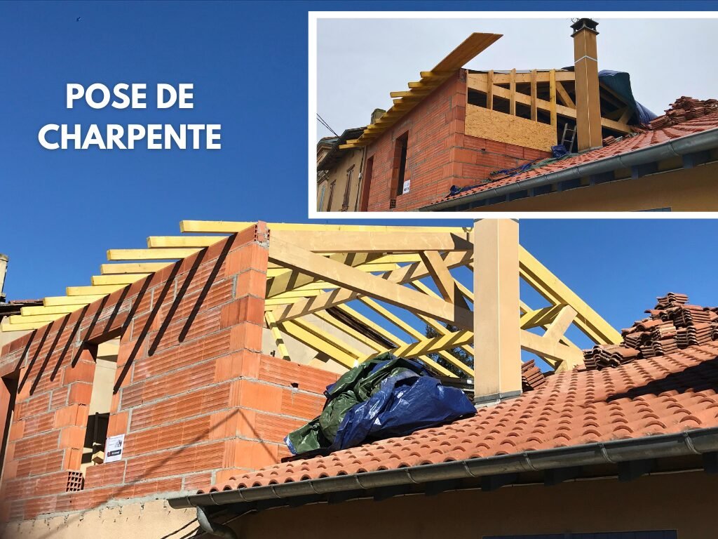 Pose de charpente sur une surélévation de maison en brique.